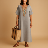 Bohemian kaftan dress for women with flowy silhouette and lightweight fabric, perfect for summer beach days, casual outings, and elegant events.