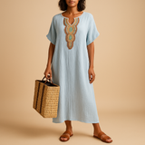 Bohemian kaftan dress for women with flowy silhouette and lightweight fabric, perfect for summer beach days, casual outings, and elegant events.