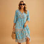 Women’s bohemian summer dress with airy fit and refined patterns, perfect for festivals, beach days, and casual summer outings.