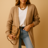 Women’s classic knitted cardigan with relaxed fit, open front, and soft breathable fabric. Perfect for layering, office wear, or casual looks.