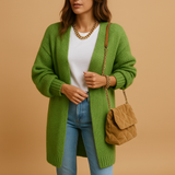 Women’s classic knitted cardigan with relaxed fit, open front, and soft breathable fabric. Perfect for layering, office wear, or casual looks.