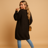 Women’s classic knitted cardigan with relaxed fit, open front, and soft breathable fabric. Perfect for layering, office wear, or casual looks.