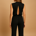 Women’s elegant halter jumpsuit with high waist, wide-leg silhouette, decorative tie, and side pockets. Perfect for parties and evenings out.