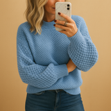 Women’s elegant knitted sweater with comfortable fit and timeless style. Ideal for autumn, winter, casual wear, or formal occasions.