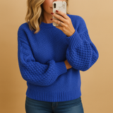 Women’s elegant knitted sweater with comfortable fit and timeless style. Ideal for autumn, winter, casual wear, or formal occasions.
