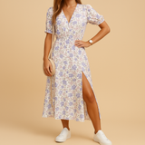 Elegant maxi dress for women with V-neck and flowy slit skirt, available in vibrant colors. Perfect for summer, vacations, and casual occasions.