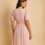 Flowy maxi dress for women with button closure and long sleeves, lightweight and elegant, ideal for work, casual outings, or formal occasions.