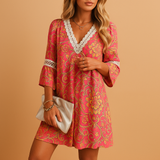 Women’s knee-length summer dress with short sleeves in blue, green, grey, and pink. Lightweight and breathable, perfect for casual days or summer parties.