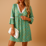 Women’s knee-length summer dress with short sleeves in blue, green, grey, and pink. Lightweight and breathable, perfect for casual days or summer parties.
