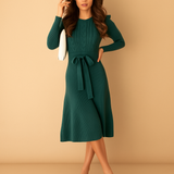 Women’s knitted autumn dress with long sleeves, round neck, and belt in beige, black, grey, red, and green – ideal for casual or office wear.