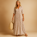 Women’s light summer dress with knee-length cut and airy fabric, perfect for spring and summer occasions from casual brunch to chic evenings.