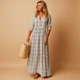 Women’s light summer dress with knee-length cut and airy fabric, perfect for spring and summer occasions from casual brunch to chic evenings.