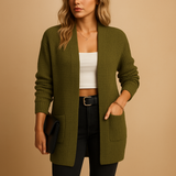Women’s long cardigan with V-neck, relaxed fit, soft breathable fabric, and pockets. Perfect for layering, work, or casual everyday wear.
