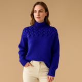 Women’s long knitted turtleneck sweater with flattering fit and soft fabric. Ideal for casual outfits, winter layering, or elegant looks.