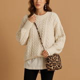 Women’s oversized chunky knit sweater with dropped shoulders, long sleeves, and soft breathable fabric. Perfect for cold days and casual layering.