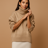Women’s oversized turtleneck sweater with relaxed silhouette and chic design. Perfect for casual wear, lounging, and seasonal layering.