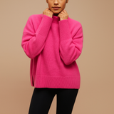 Women’s oversized turtleneck sweater with relaxed silhouette and chic design. Perfect for casual wear, lounging, and seasonal layering.