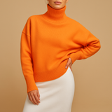Women’s oversized turtleneck sweater with relaxed silhouette and chic design. Perfect for casual wear, lounging, and seasonal layering.