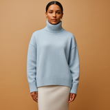 Women’s oversized turtleneck sweater with relaxed silhouette and chic design. Perfect for casual wear, lounging, and seasonal layering.