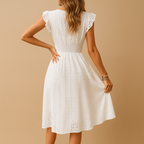 Women’s white sleeveless midi dress with ruffle details, lightweight and breathable, perfect for summer days, parties, and vacations.
